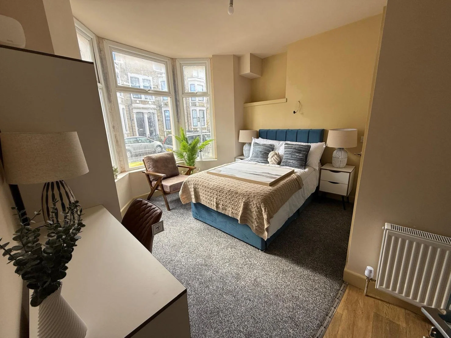 After: Bedroom with original bay windows